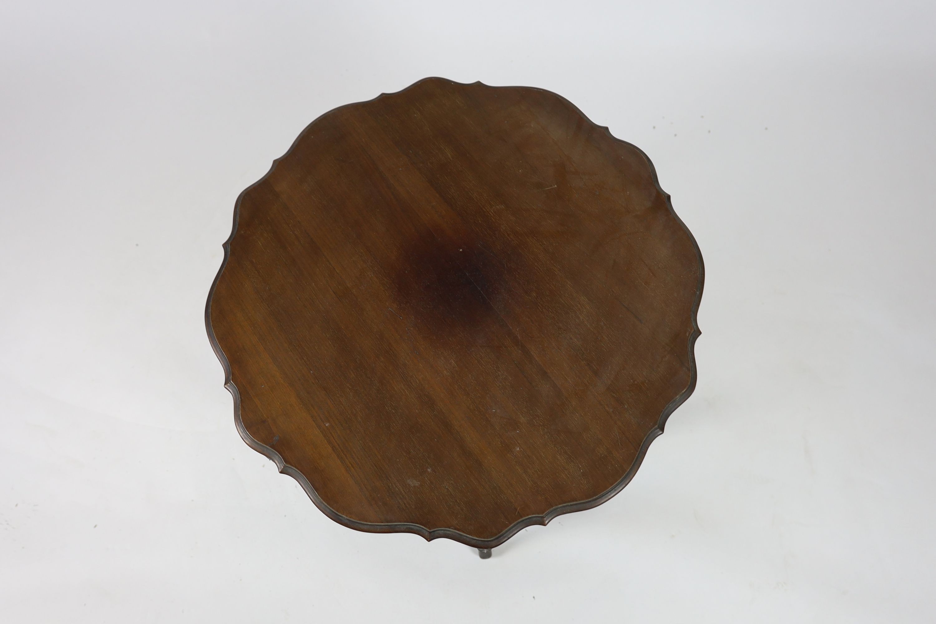 A late Victorian mahogany centre table, with shaped circular top, diameter 74cm height 69cm